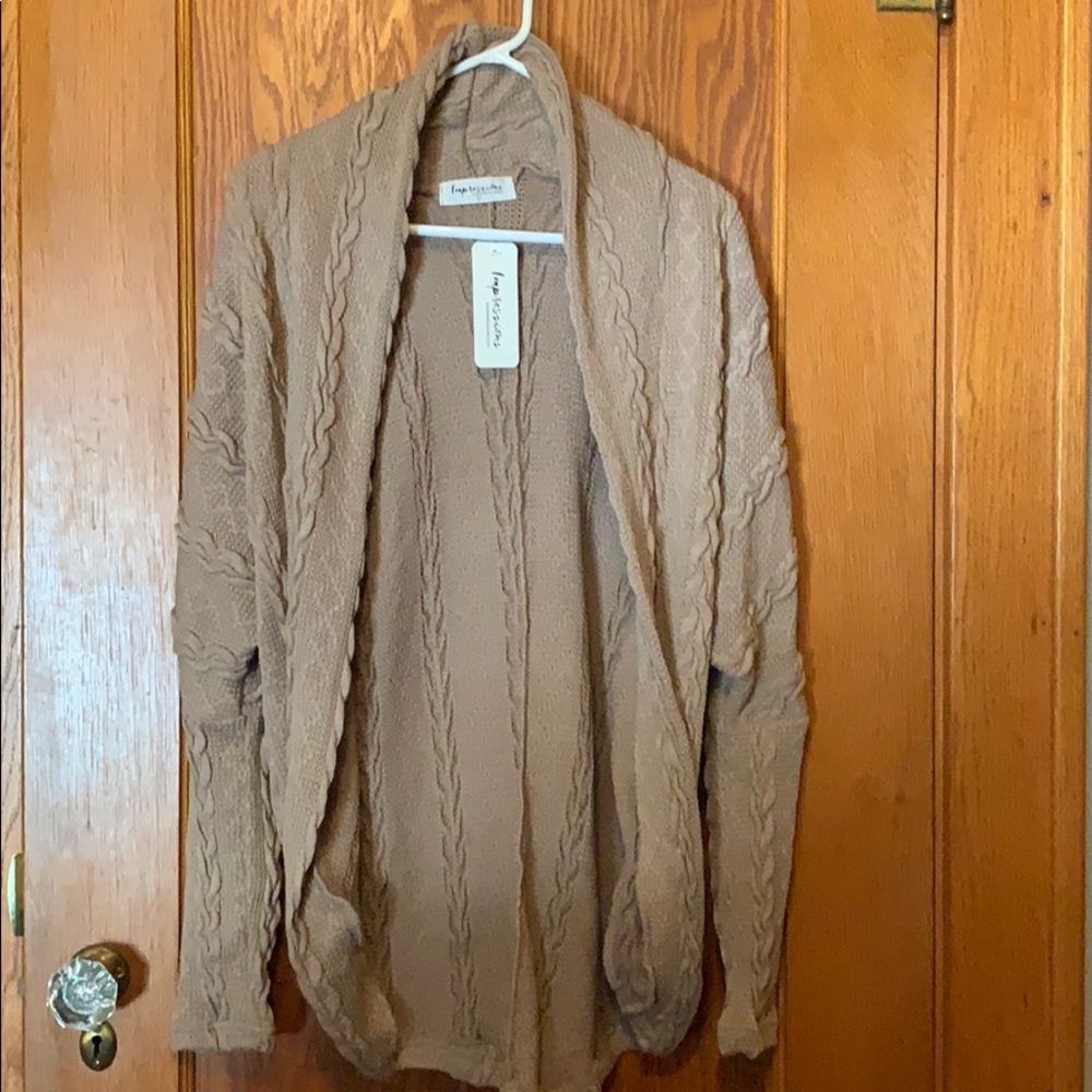 Tan cardigan. Smoke free home.